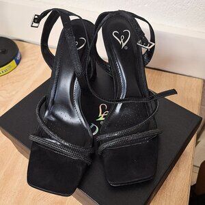 black heeled shoes